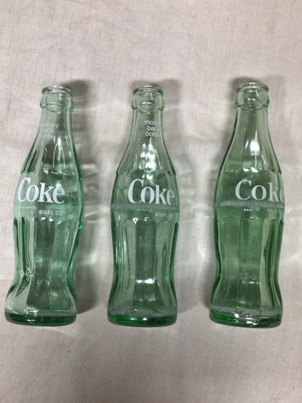 Coke Embossed Glass Bottle Trio - Green Soda Bottles